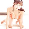 Rio Natsume posing in sexy orange bikini her natural breasts - image control.gallery.php